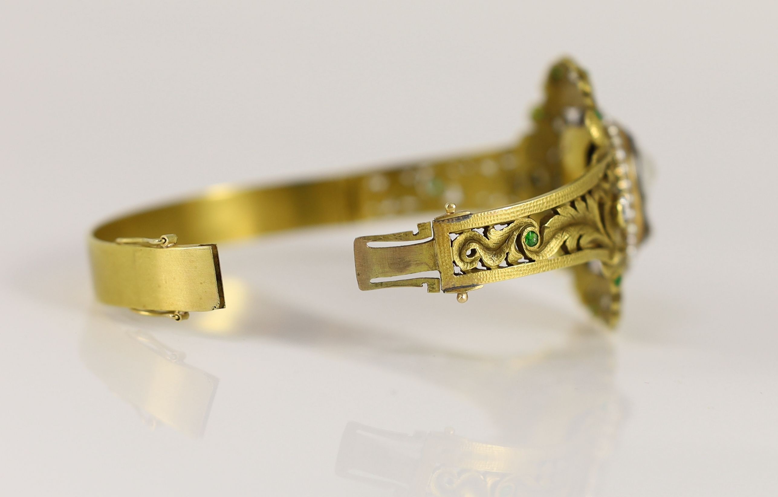 A Victorian gold, sardonyx cameo, split pearl, diamond and demantoid garnet set hinged bangle